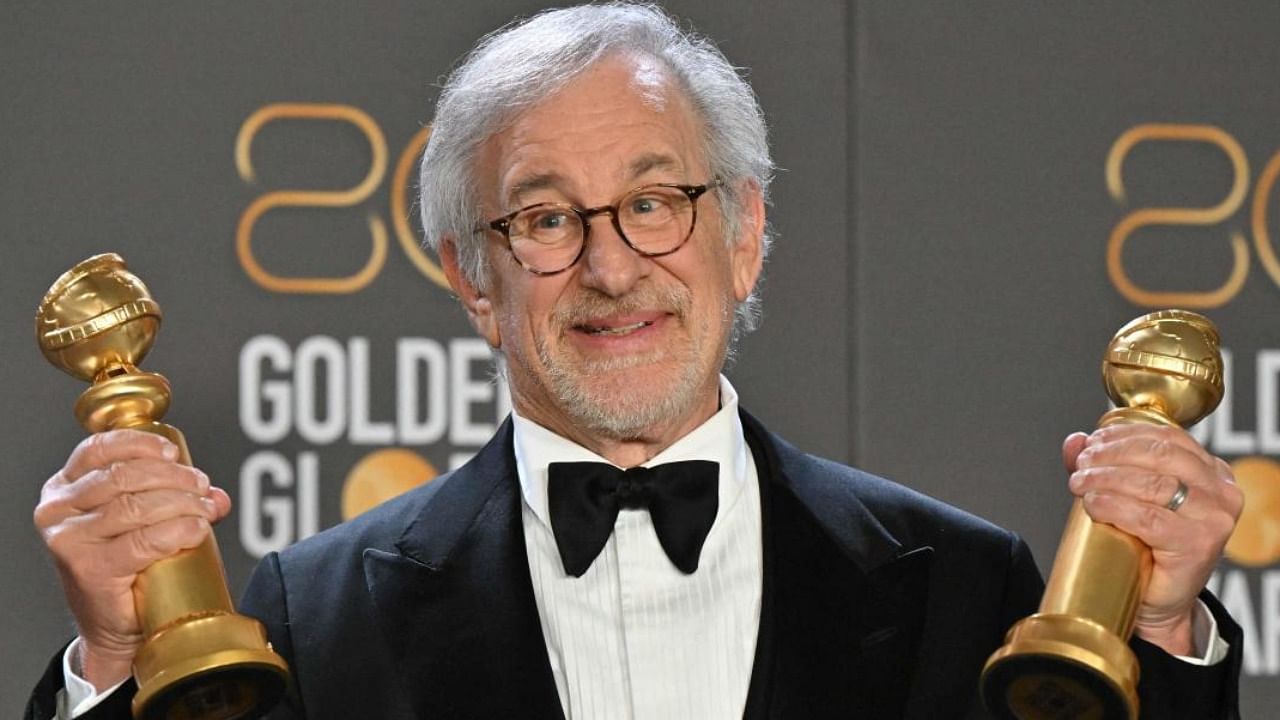 Steven Spielberg poses with the awards for Best Director - Motion Picture and Best Picture - Drama for 'The Fabelmans'. Credit: AFP Photo
