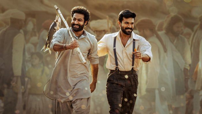 A poster of Telugu film 'RRR' featuring actors Jr. NTR and Ram Charan. Credit: PTI File Photo