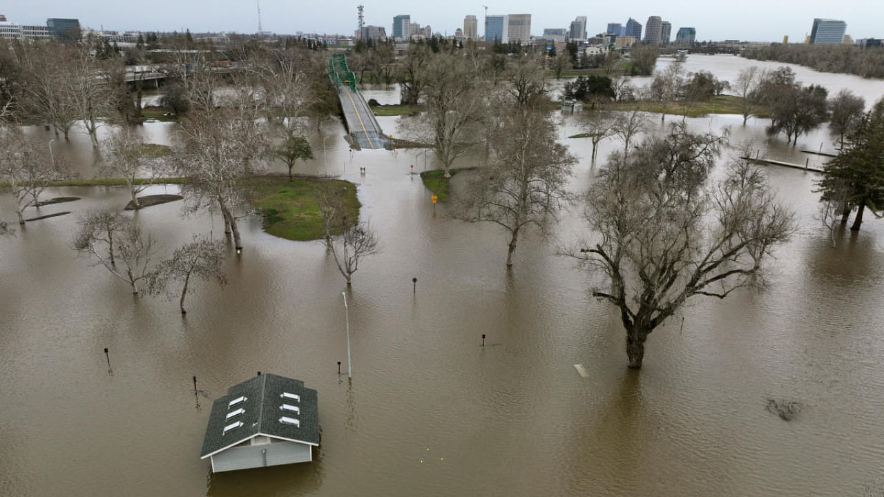 View of flooding from the rainstorm-swollen Sacramento and American Rivers, near downtown Sacramento, California. Credit: Reuters Photo