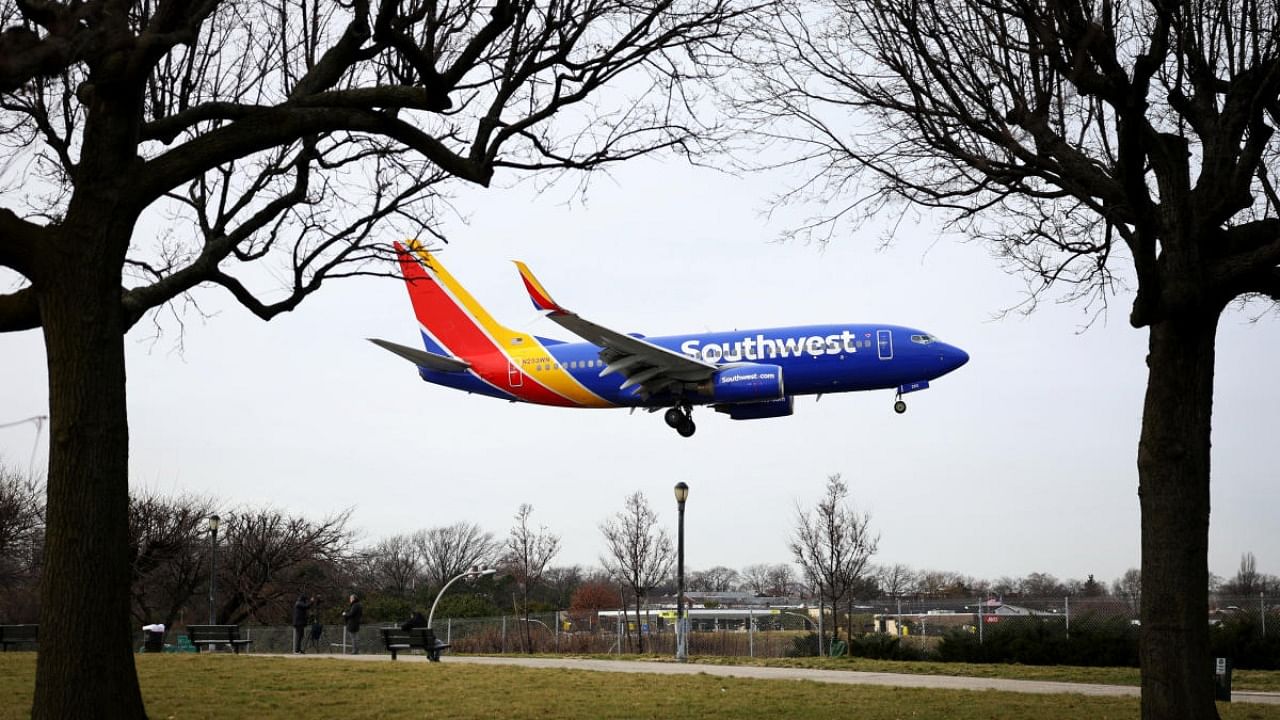A Southwest Airlines jet comes in for a landing after flights earlier were grounded during an FAA system outage at Laguardia Airport in New York City. Credit: Reuters photo