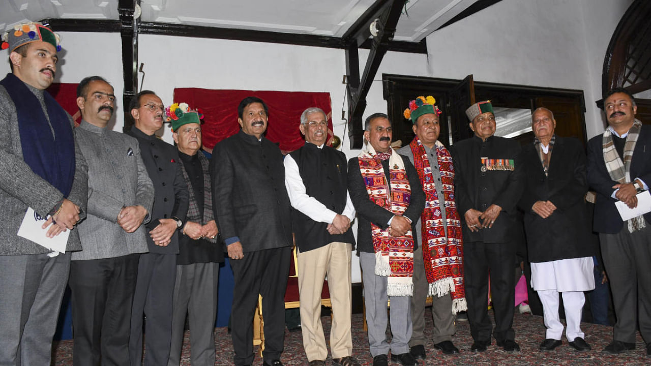 Himachal CM and Governor during the oath taking ceremony of the new ministers. Credit: PTI Photo