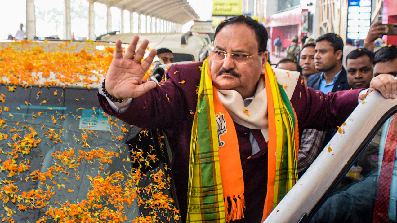  BJP National President JP Nadda being welcomed by supporters during a visit to poll-bound Tripura, in Agartala. Credit: PTI Photo