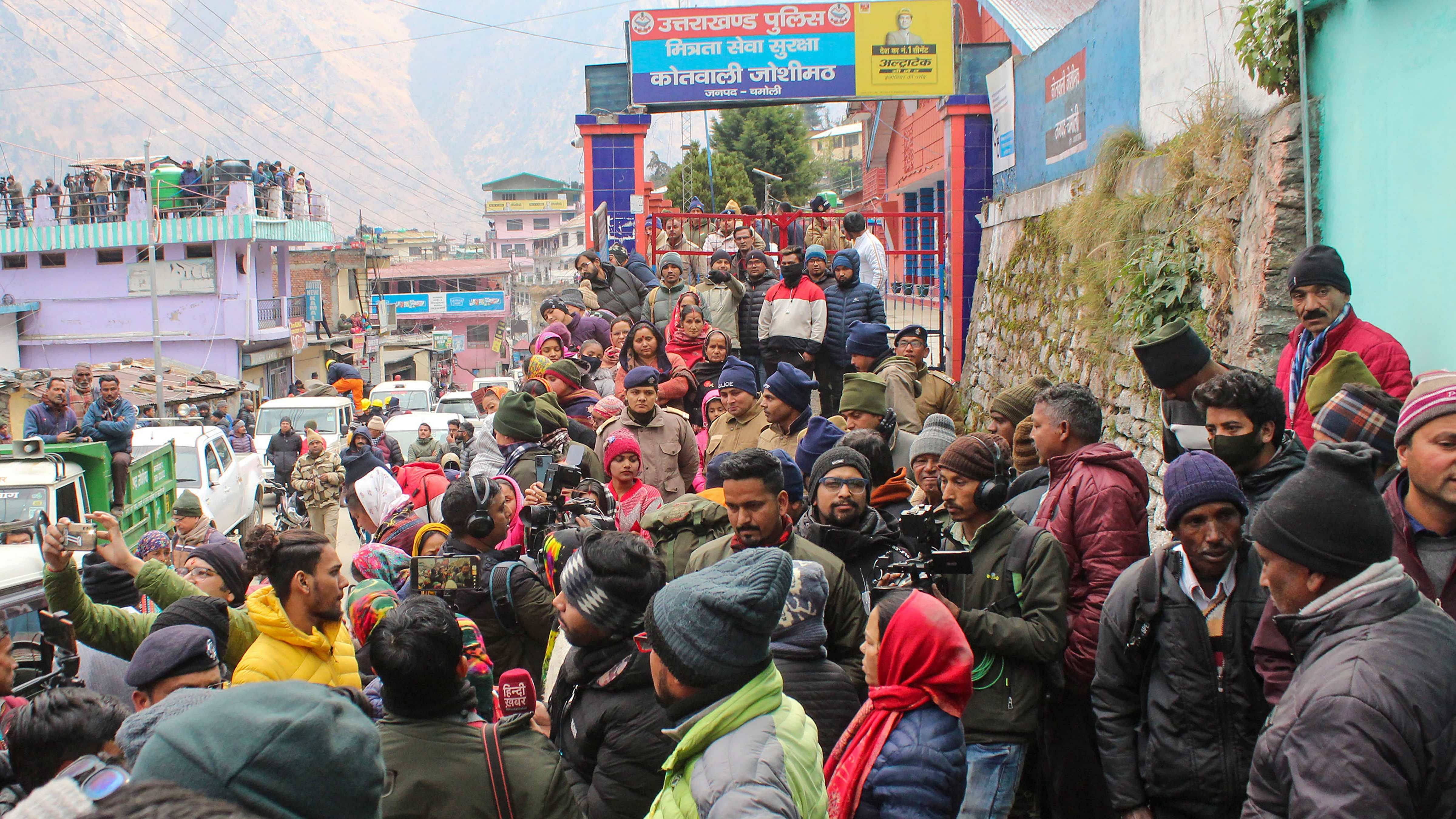 Crowd of people outside Hotel Malari Inn ahead of its demolition. Credit: PTI Photo
