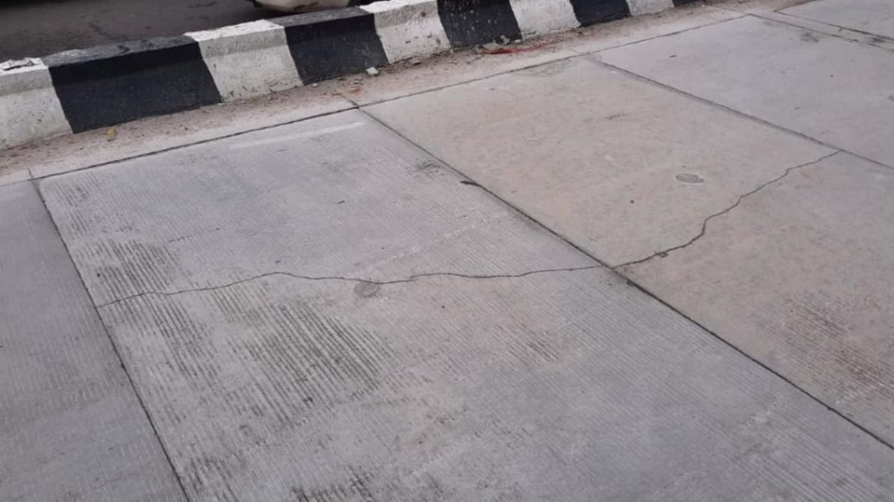 A third-party review was sought after multiple cracks appeared on the road, raising questions over the life of the project. Credit: DH Photo