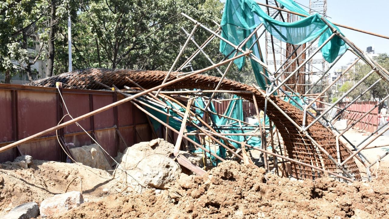 The collapsed pillar of the under-construction Namma Metro in Outer Ring Road. Credit: DH Photo