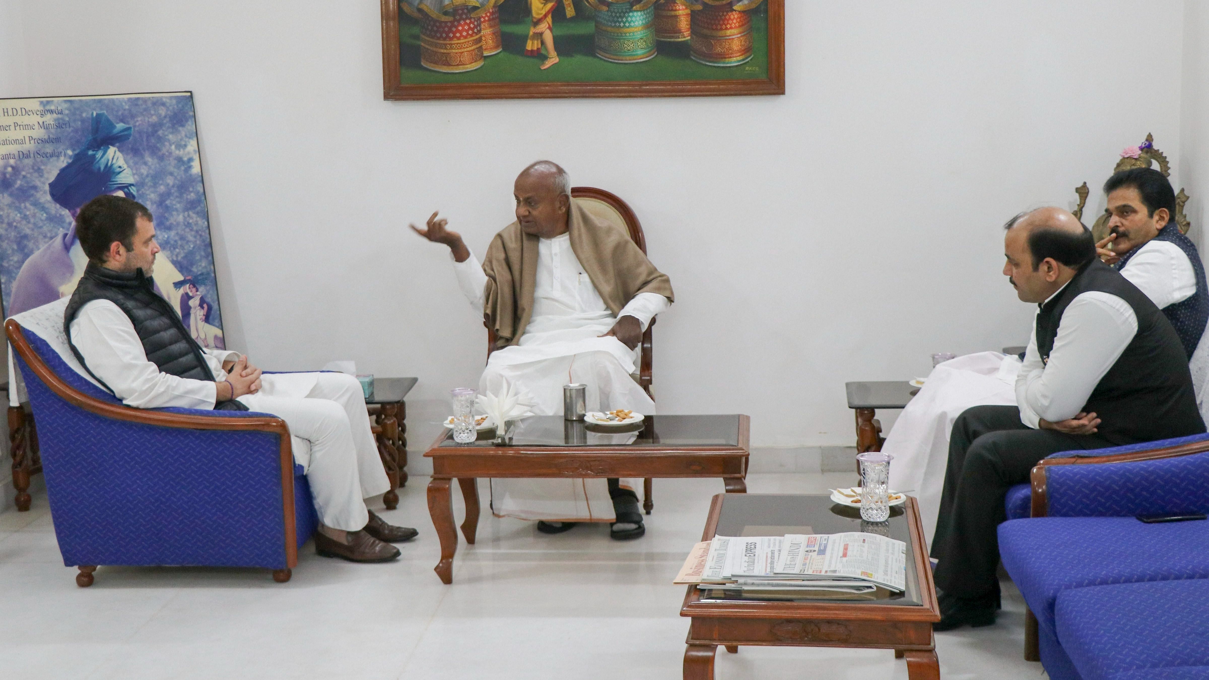A file photo of Rahul Gandhi meeting HD Deve Gowda. Credit: PTI Photo