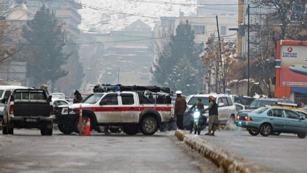 Taliban security forces block a road after a suicide blast near Afghanistan's foreign ministry at the Zanbaq Square in Kabul. Credit: AFP Photo