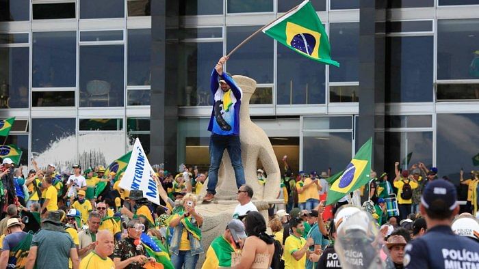 Many also believe widespread disinformation -- often promoted by Bolsonaro himself -- that the election was rigged and Lula an illegitimate leader with plans to turn Brazil into a Venezuela-style "communist" state. Credit: AFP Photo