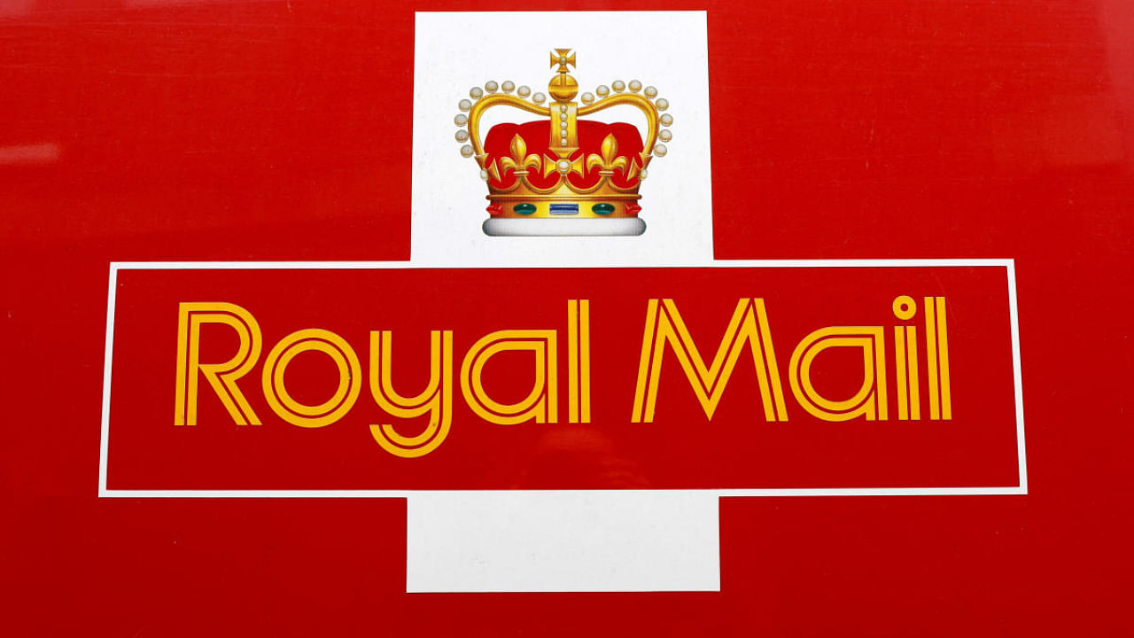  A Royal Mail sign is pictured on a delivery van outside a Post Office, in St Albans, Britain. Representative Image. Credit: Reuters File Photo