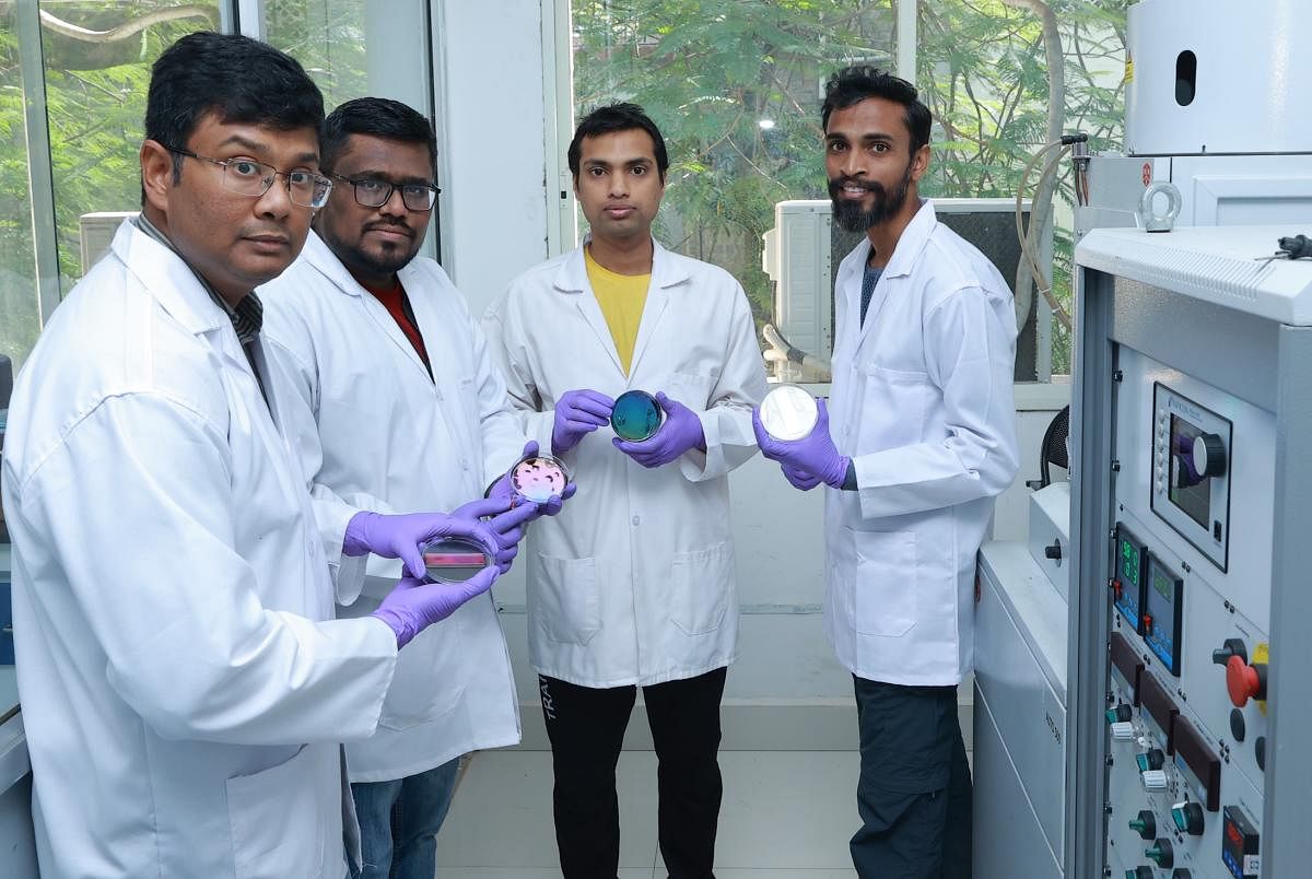 (Left to right) Researchers Tapajyoti Das Gupta, Mark V, Renu Raman Sahu and Alwar Samy Ramasamy along withsamples of structural colours fabricated through nanotechnology. (Special arrangement)