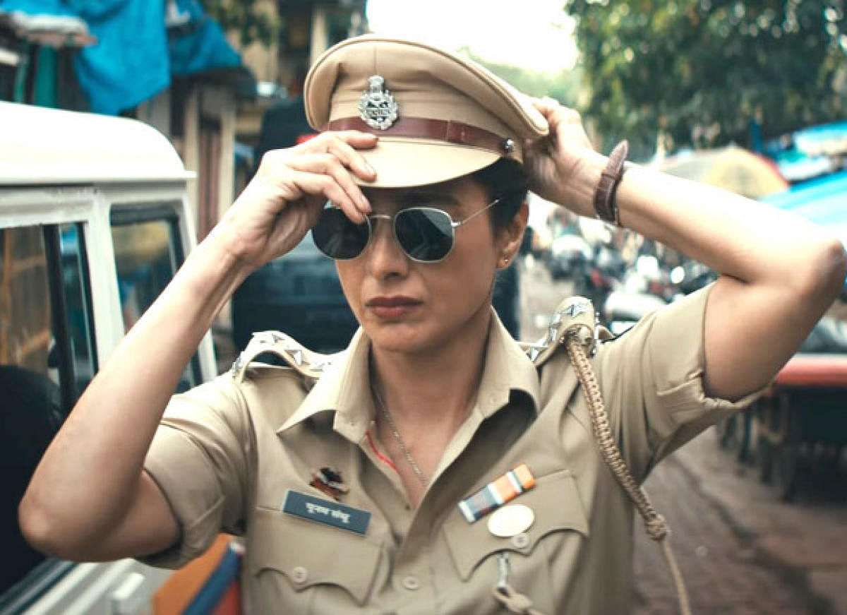 Tabu shines as a cop.