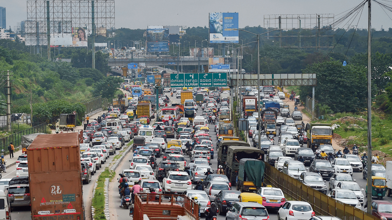 Despite cities like Bengaluru offering a variety of public transport options, such as metro, suburban rails and buses, the number of takers for them remains limited. Credit: PTI Photo