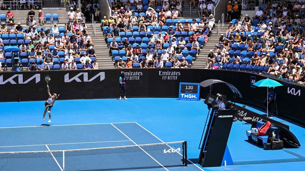 USA's Danielle Collins serves against Russia's Anna Kalinskaya during their women's singles match on day one of the Australian Open tennis tournament in Melbourne. Credit: AFP Photo