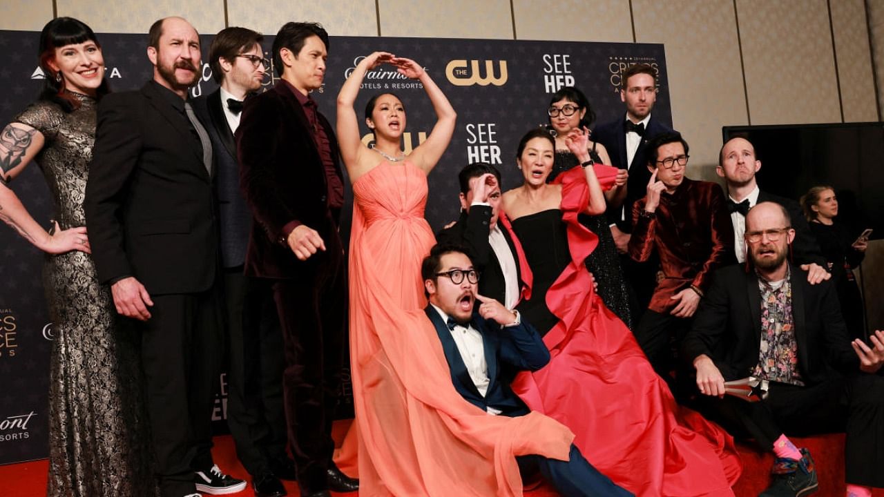 The cast and crew of "Everything Everywhere All at Once" pose after winning the Best Picture award at the 28th annual Critics Choice Awards. Credit: Reuters Photo