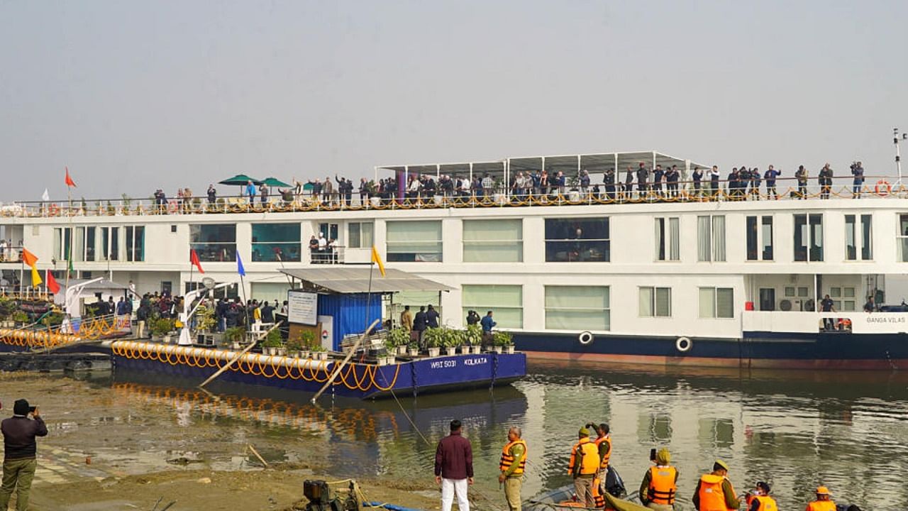 People aboard the world's longest river cruise MV Ganga Vilas after it was flagged off by Prime Minister Narendra Modi during a ceremony, in Varanasi, Friday, Jan. 13, 2023. Credit: PTI Photo