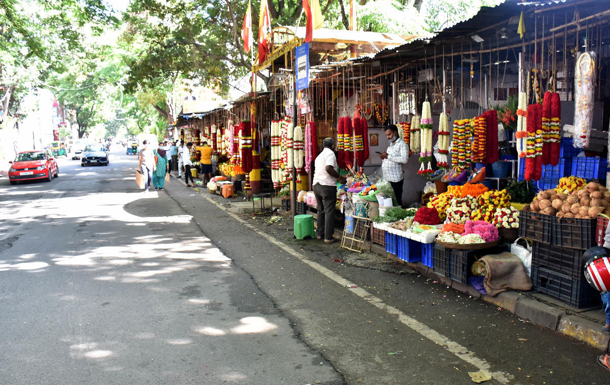 The vendors at the market continue to do business from temporary shops allotted to them when the work began in 2015. Credit: DH File Photo