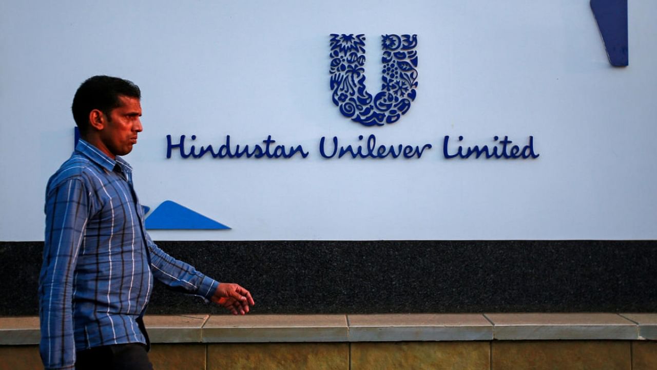 A pedestrian walks past the Hindustan Unilever Limited (HUL) headquarters in Mumbai. Credit: Reuters File Photo