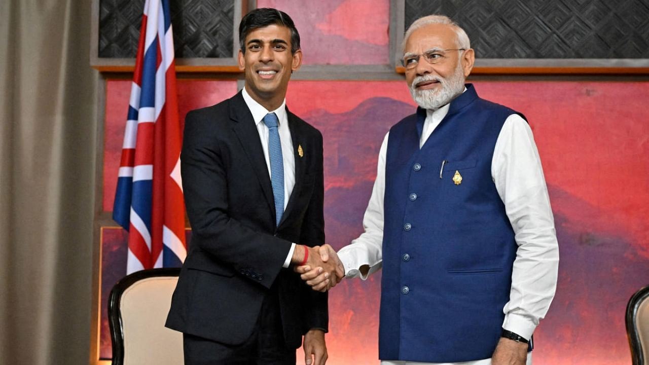 British Prime Minister Rishi Sunak and India's Prime Minister Narendra Modi. Credit: Reuters File Photo