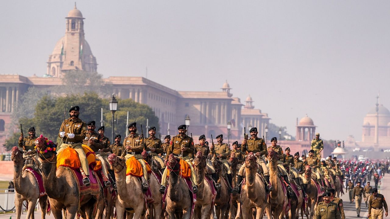 BSF's camel-mounted soldiers march past during rehearsals for the Republic Day Parade 2023 at Kartavya Path, in New Delhi. Credit: PTI Photo