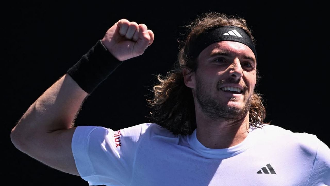 Greece's Stefanos Tsitsipas celebrates after victory against Netherlands' Tallon Griekspoor during their men's singles match on day five of the Australian Open tennis tournament in Melbourne on January 20, 2023. Credit: AFP Photo