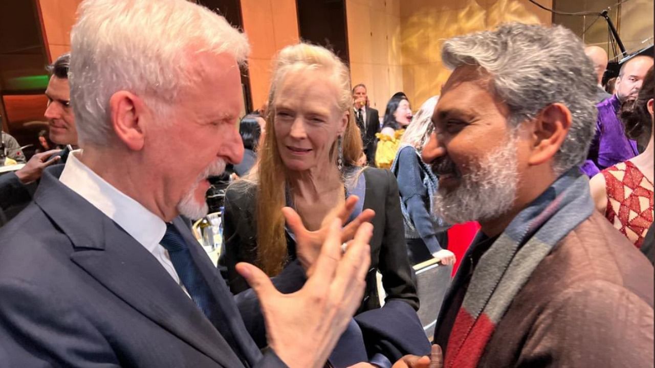 Rajamouli and RRR composer MM Keeravani recently met Cameron at the Critics' Choice Awards (CCA) where the movie won the Best Foreign Language Film and Best Song for Telugu track Naatu Naatu. Credit: Twitter/@ssrajamouli