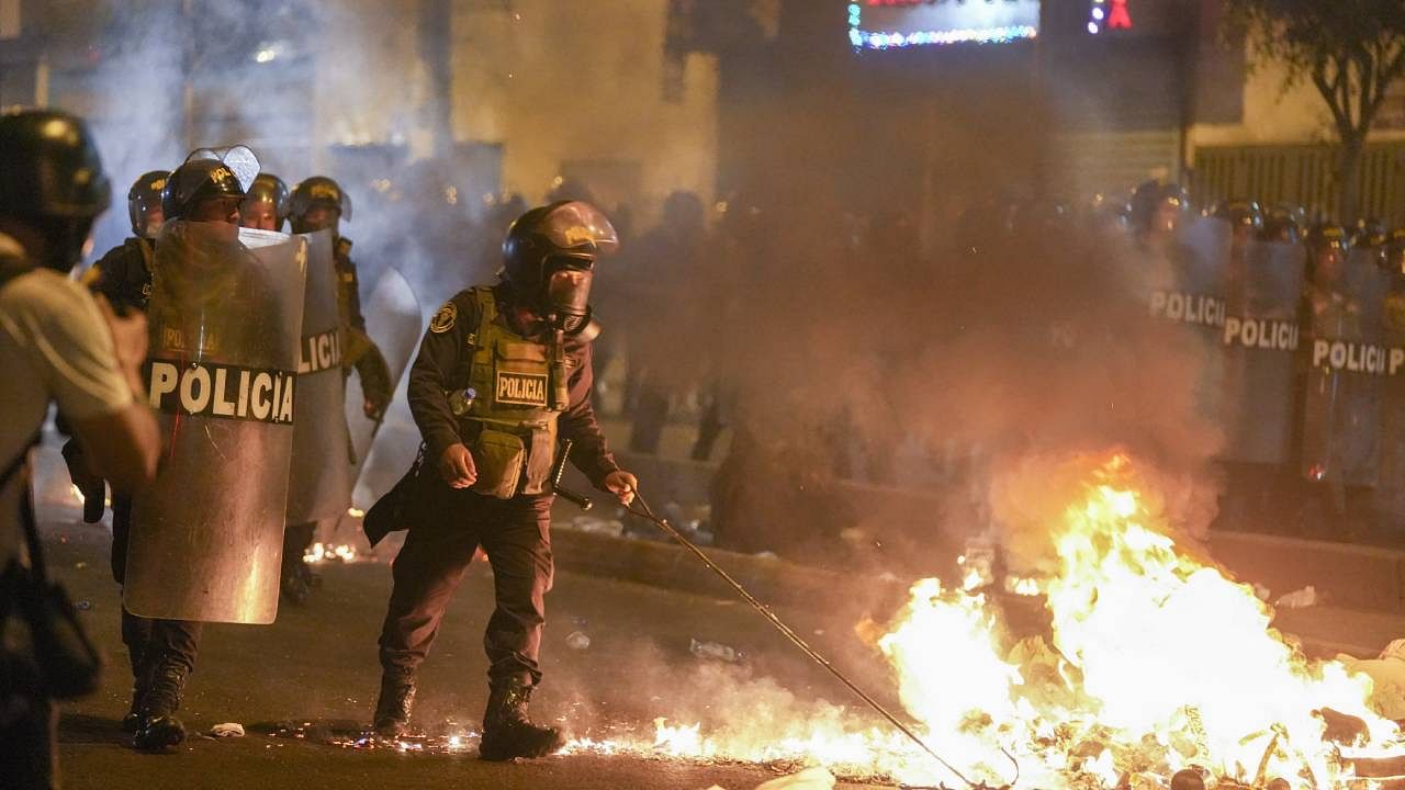 Police clear a street during anti-government protests in Lima, Peru. Credit: AP/PTI Photo