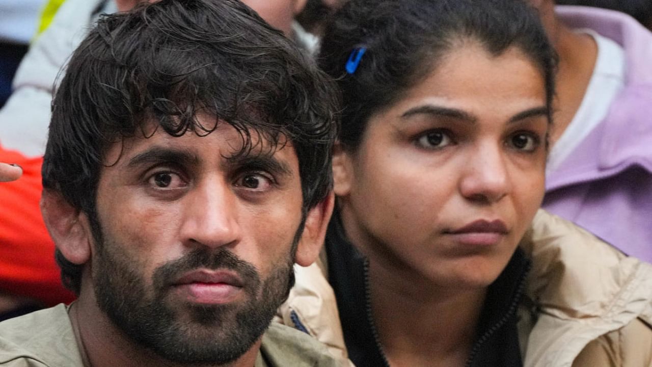 Wrestlers Bajrang Punia (L) and Sakshi Malik. Credit: PTI Photo