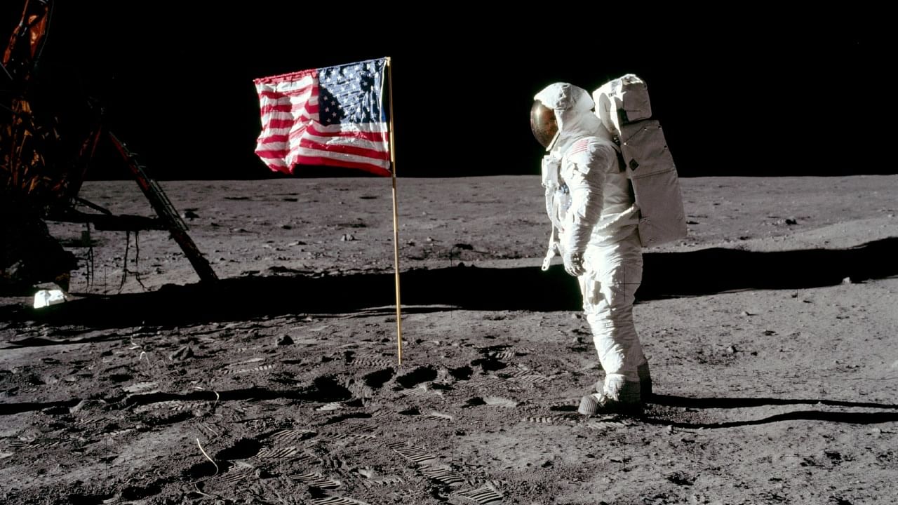 Astronaut Buzz Aldrin, lunar module pilot for Apollo 11, poses for a photograph besides the United States flag during an extravehicular activity on the moon, July 20, 1969. Credit: Reuters File Photo