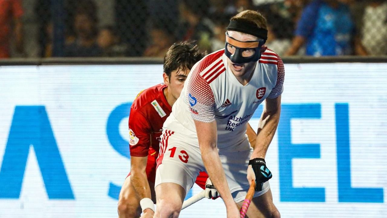 Sam Ward, donning a mask, is back leading the England attack at this FIH World Cup in Bhubaneswar and Rourkela. Credit: Hockey India