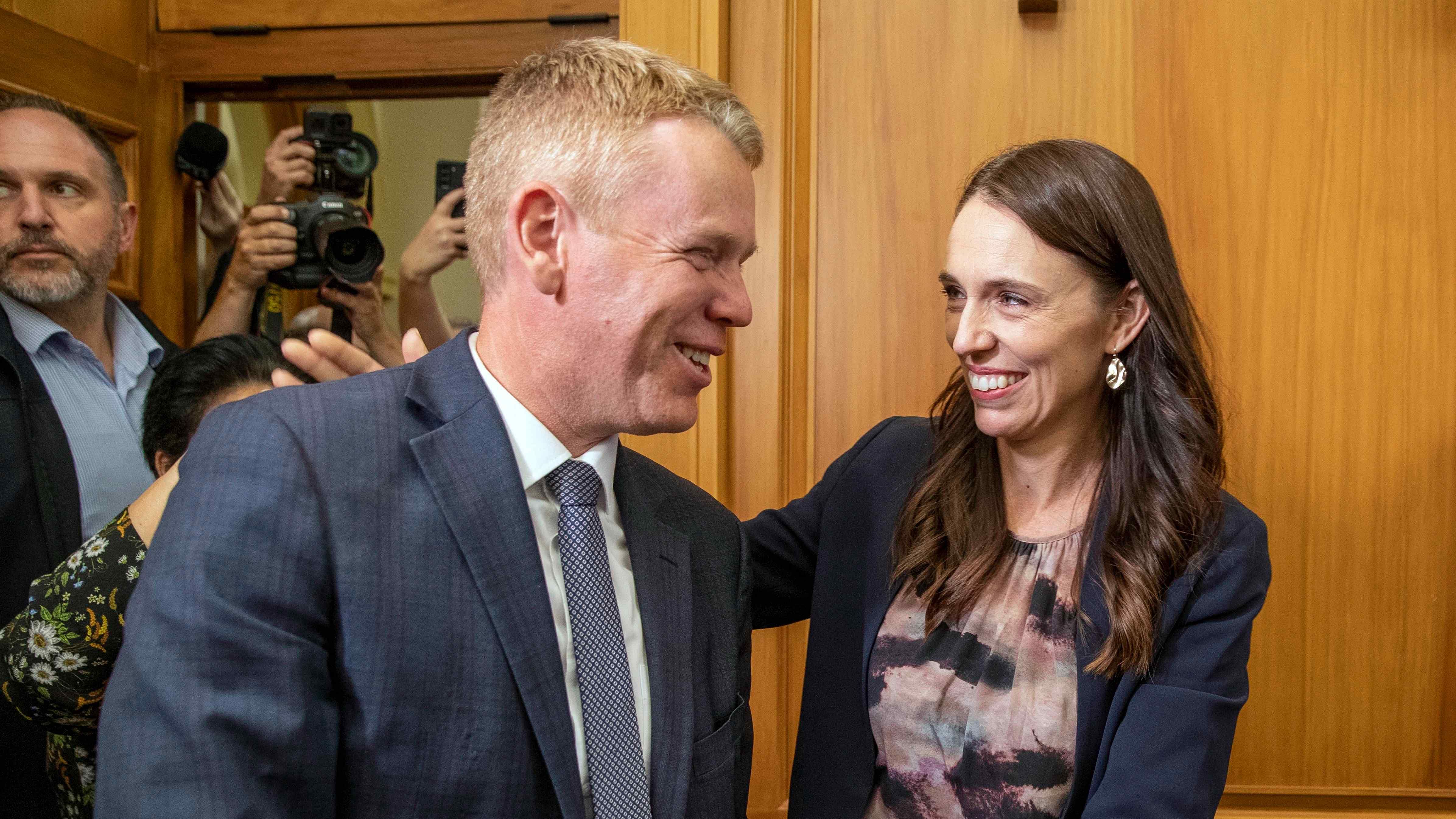New Zealand Prime Minister Jacinda Ardern, right, and new Labour Party leader Chris Hipkins arrive for their caucus vote at Parliament in Wellington. Credit: AP Photo