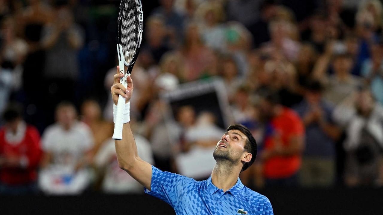 Serbia's Novak Djokovic celebrates winning his fourth round match against Australia's Alex De Minaur. Credit: Reuters Photo