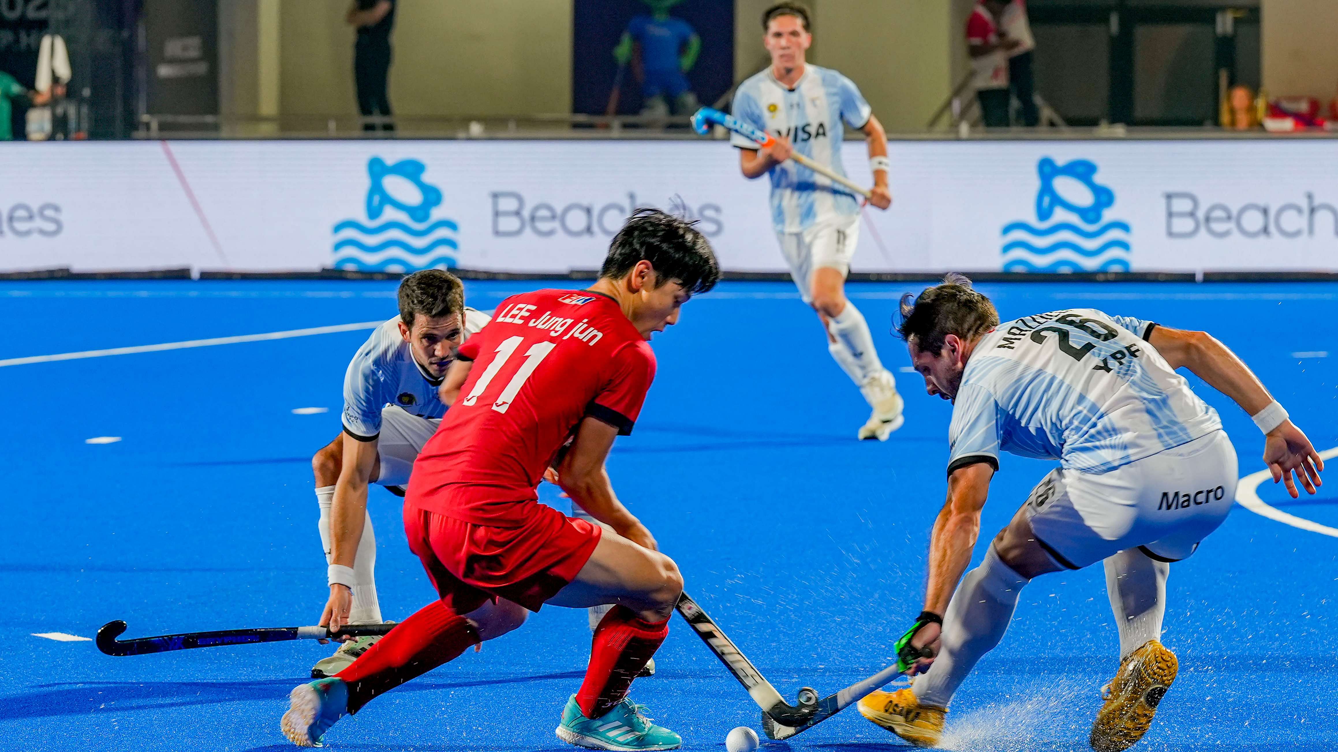 South Korea’s LEE Jungjun and Argentina’s Agustin Mazzilli vie for the ball during the 2023 Men's FIH Hockey World Cup match. Credit: PTI Photo