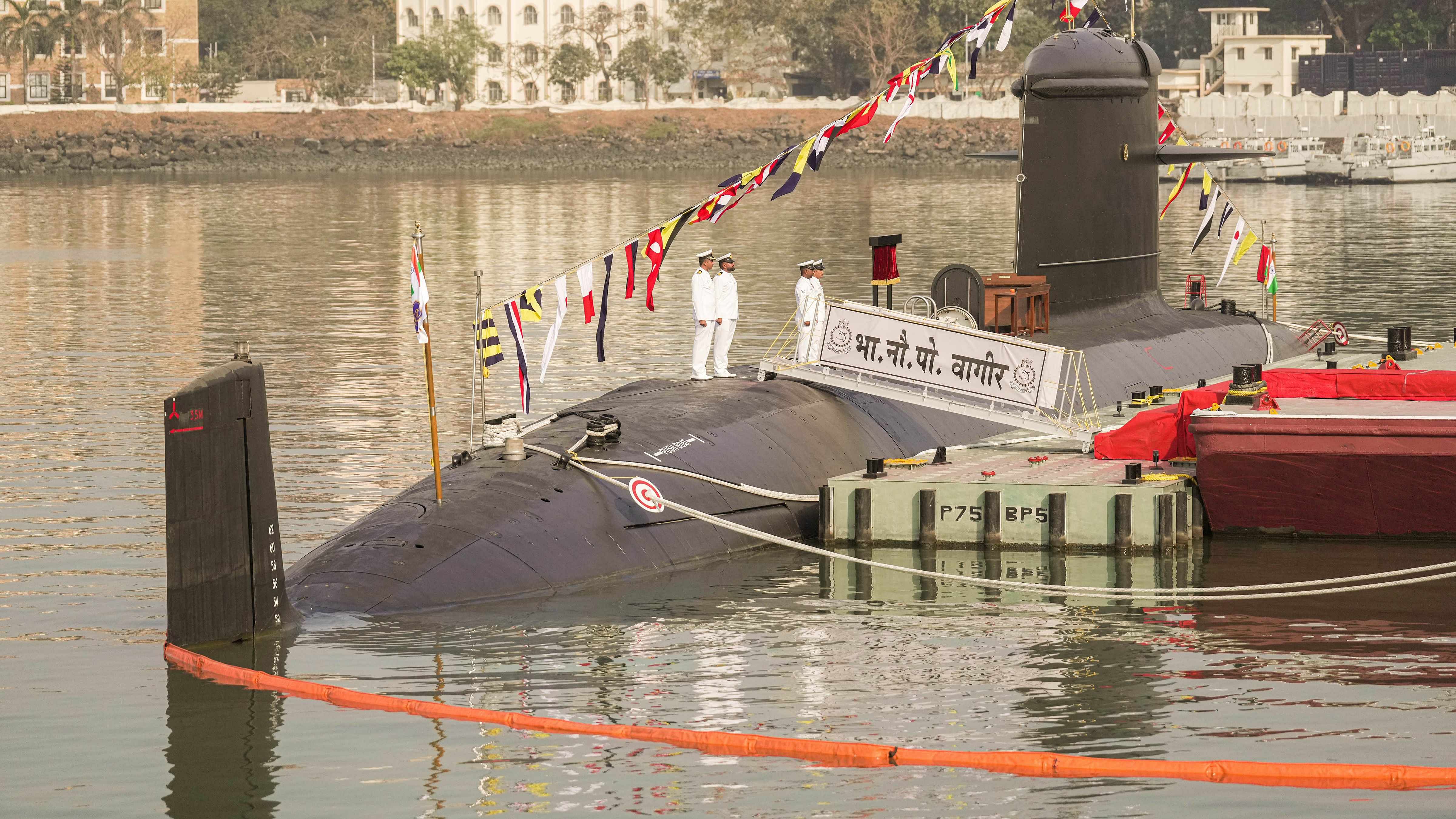 Naval officers onboard the fifth Kalvari-class submarine 'INS Vagir' during its commissioning ceremony. Credit: PTI Photo