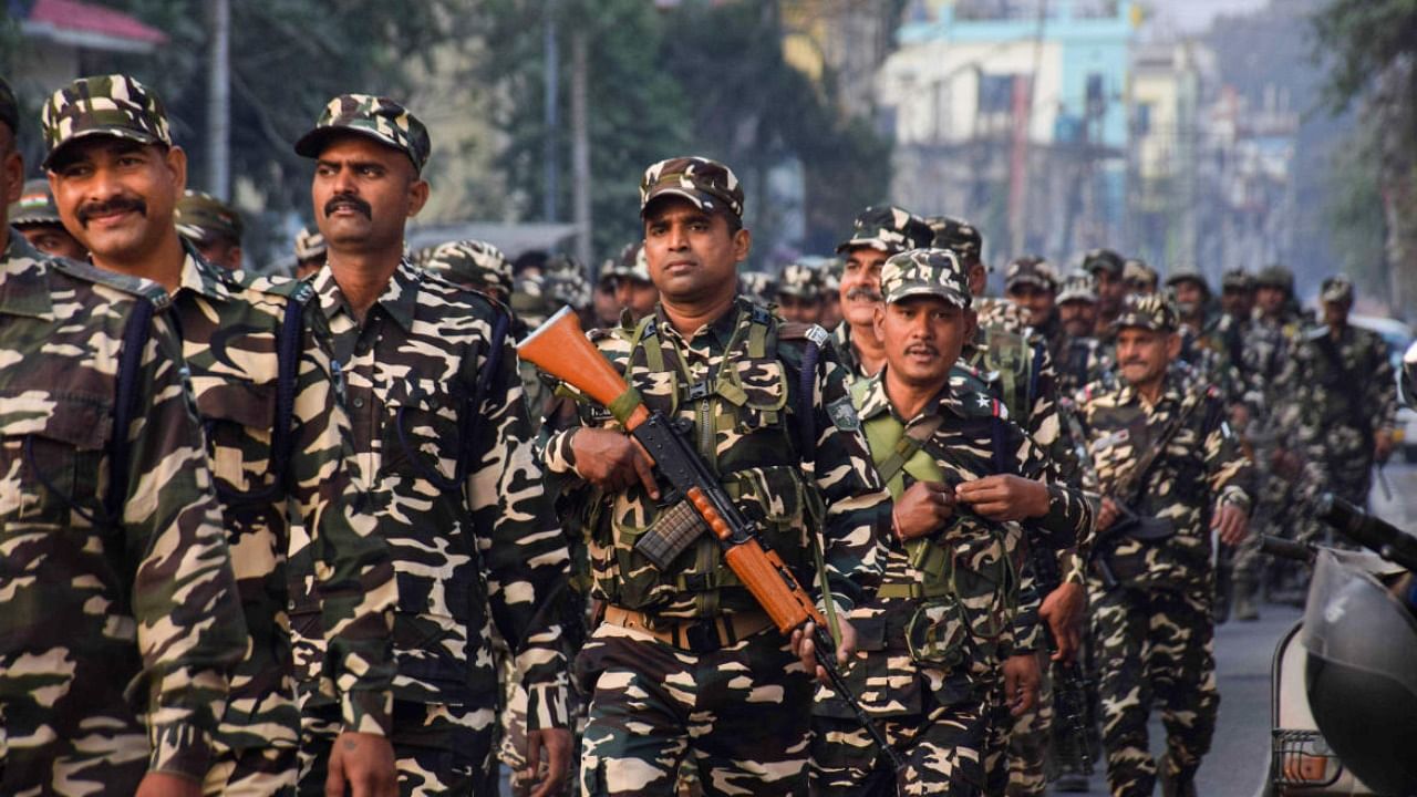 CRPF personnel during a flag march ahead of Tripura Assembly elections in Agartla. Credit: PTI Photo