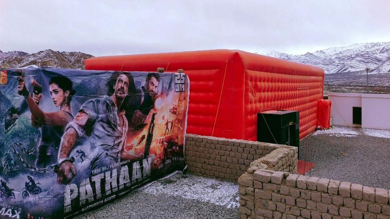 Shah Rukh Khan's newly-released movie 'Pathaan' being screened at a travelling cinema hall in Ladakh. credit: PTI Photo