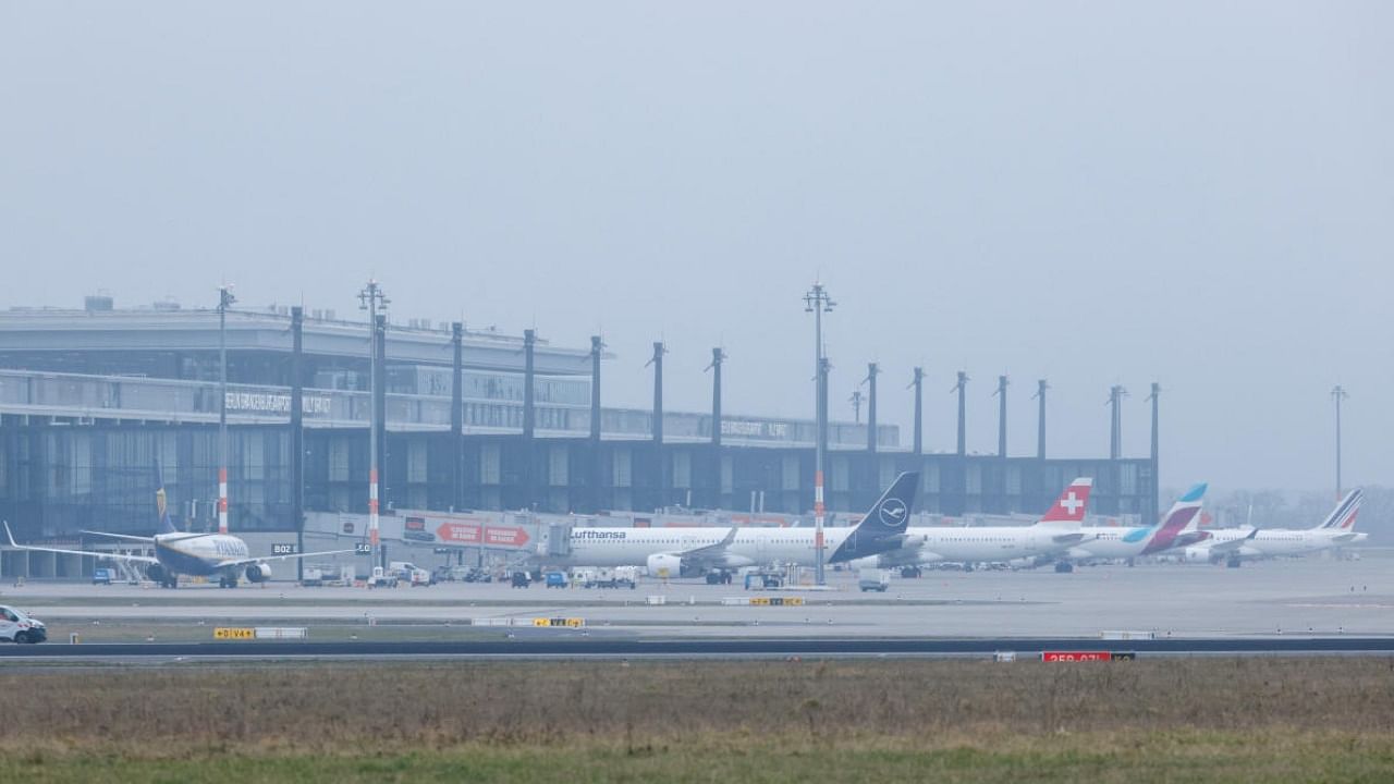 Planes are parked at the Berlin Brandenburg Airport (BER) during a general strike by employees over pay demands. Credit: Reuters Photo