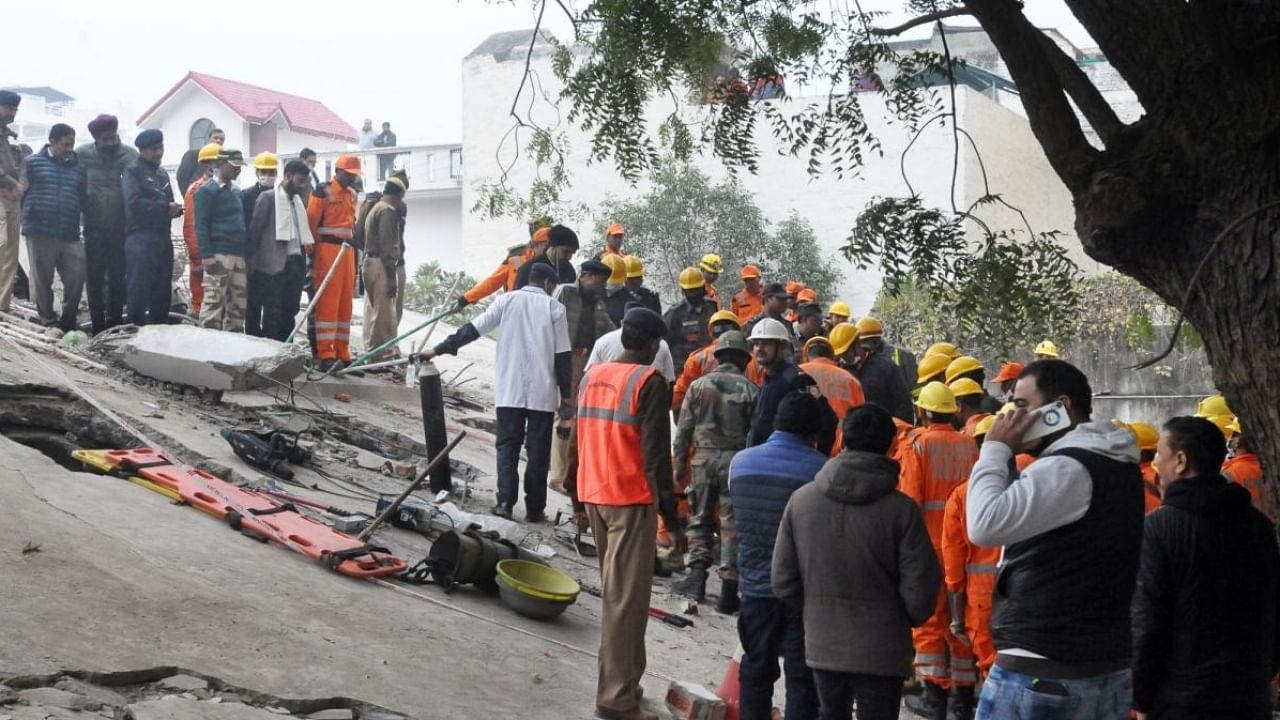 Rescue work onway after Lucknow building collapse. Credit: IANS Photo