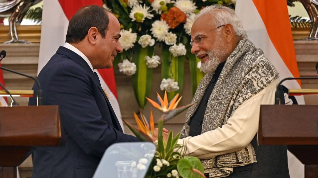 Prime Minister Narendra Modi shakes hands with Egypt’s President Abdel Fattah El-Sisi. Credit: AFP Photo