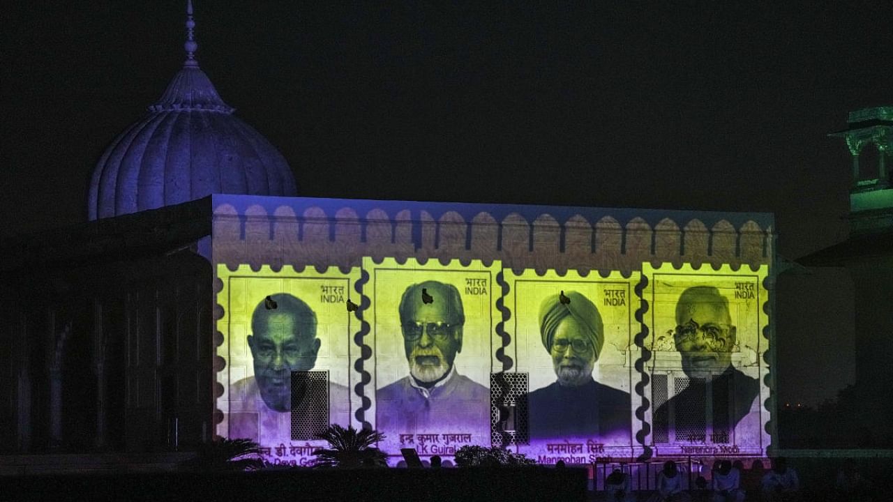 Images of Prime Ministers of India during the light and sound show inaugurated by Union Home Minister Amit Shah at Red Fort. Credit: PTI Photo