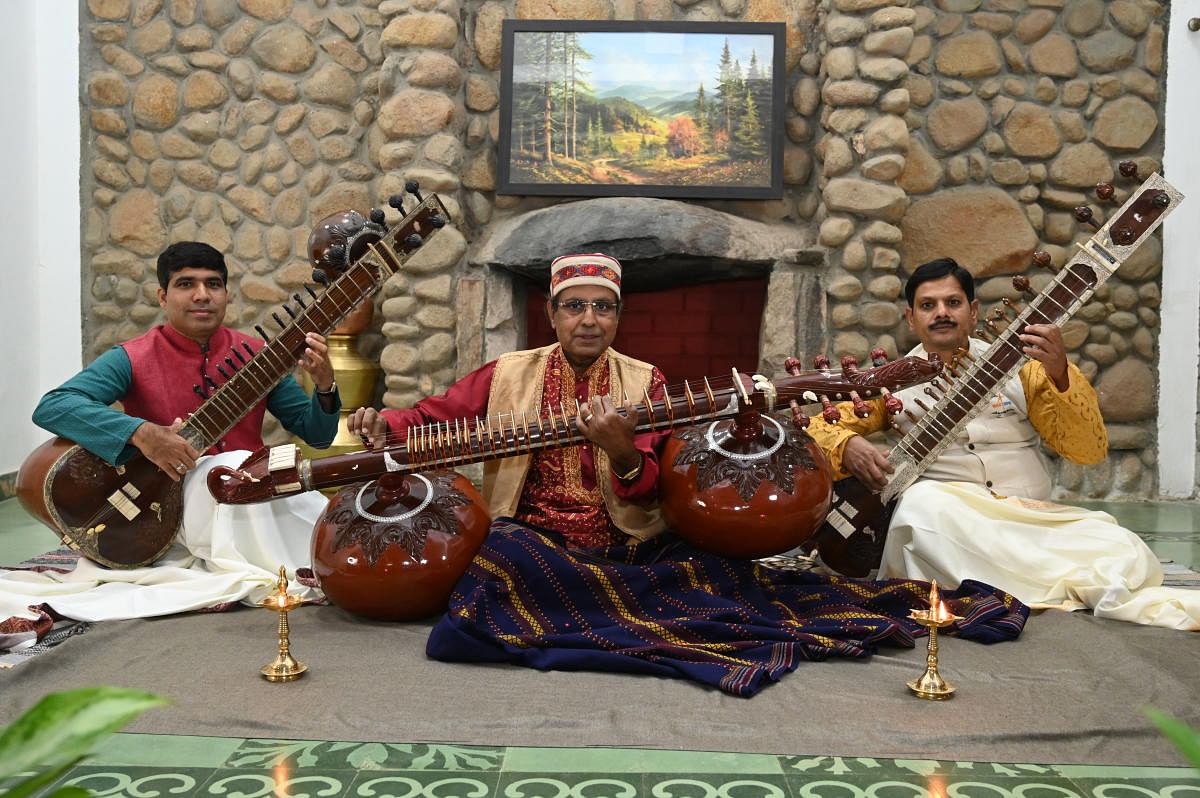 Jayanta Kumar Das with the rudra veena (centre). He is the director of the centre, and seen with assistant directors Manoj Kumar (left) and Venkatesha G.