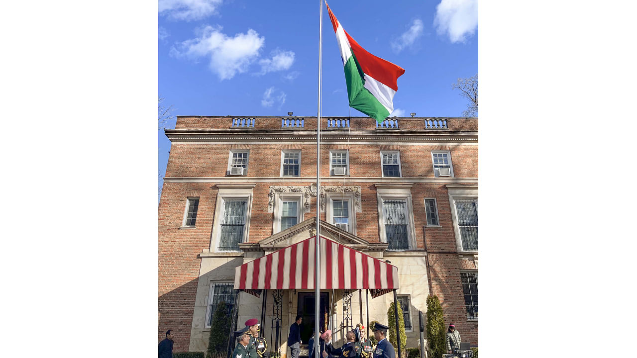 Indian Ambassador to the US Taranjit Singh Sandhu hoists the Tricolor to celebrate the country's 74th Republic Day in Washington. Credit: PTI Photo