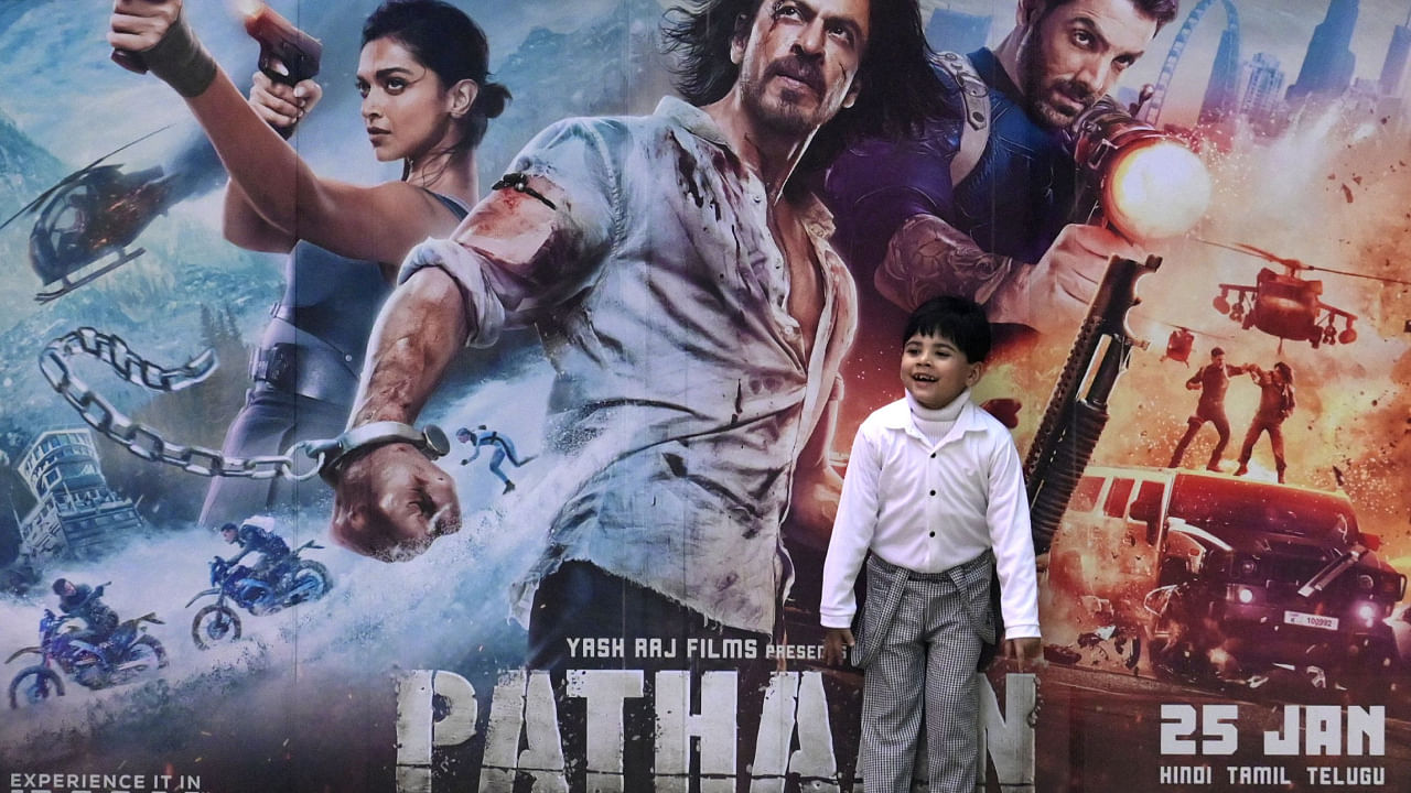 'Pathaan', which is Shah Rukh's first big screen release in over four years, had raised Rs 106 crore globally on its opening day, followed by Rs 113.6 crore on day two. Credit: AFP Photo