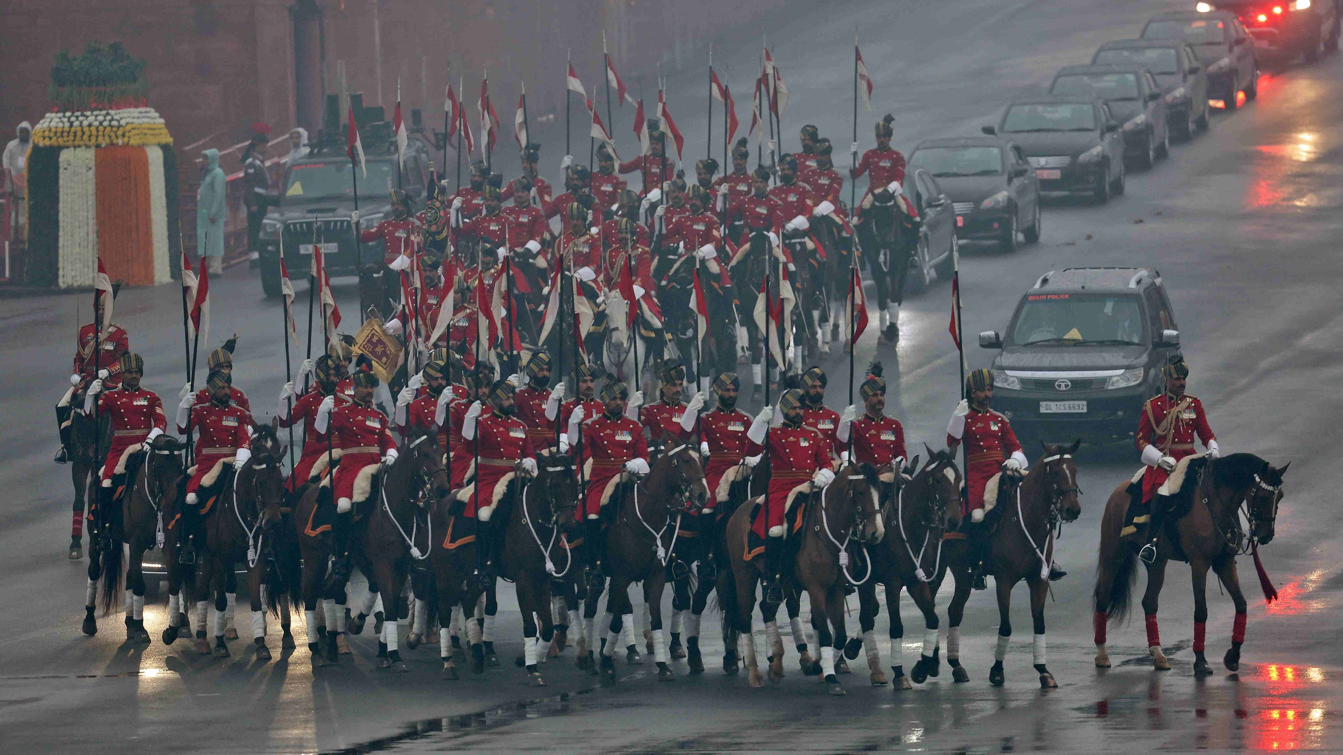 The President's Bodyguards, mounted on their horses, escort the car carrying India's President Droupadi Murmu as she arrives for the Beating Retreat ceremony in New Delhi. Credit: Reuters Photo