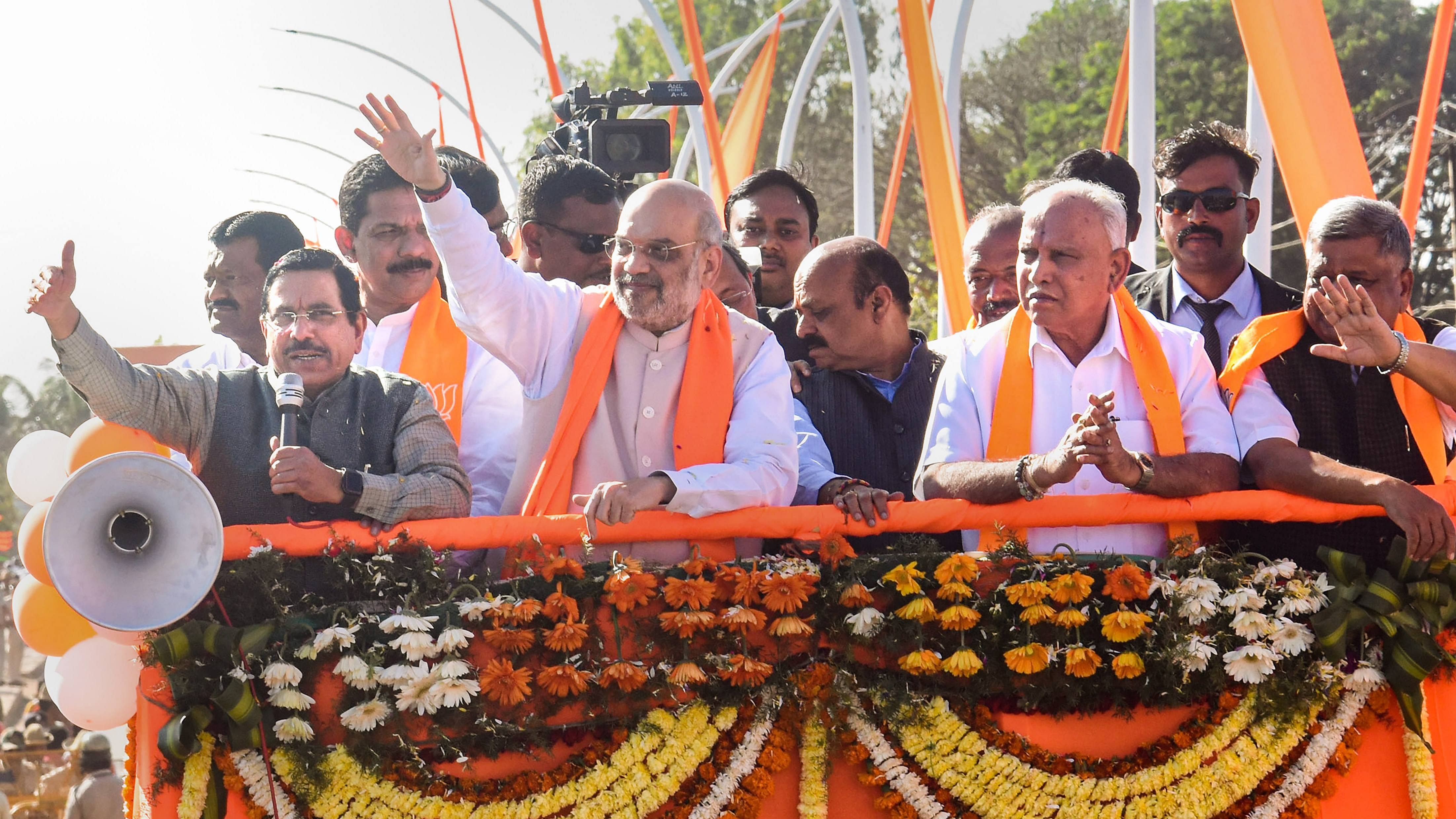 Shah’s roadshow is seen as a major activity as part of the BJP’s efforts to win the Kundgol seat, which it lost to Congress with a margin of 634 votes in 2018 and 1,601 votes in 2019.  Credit: PTI Photo