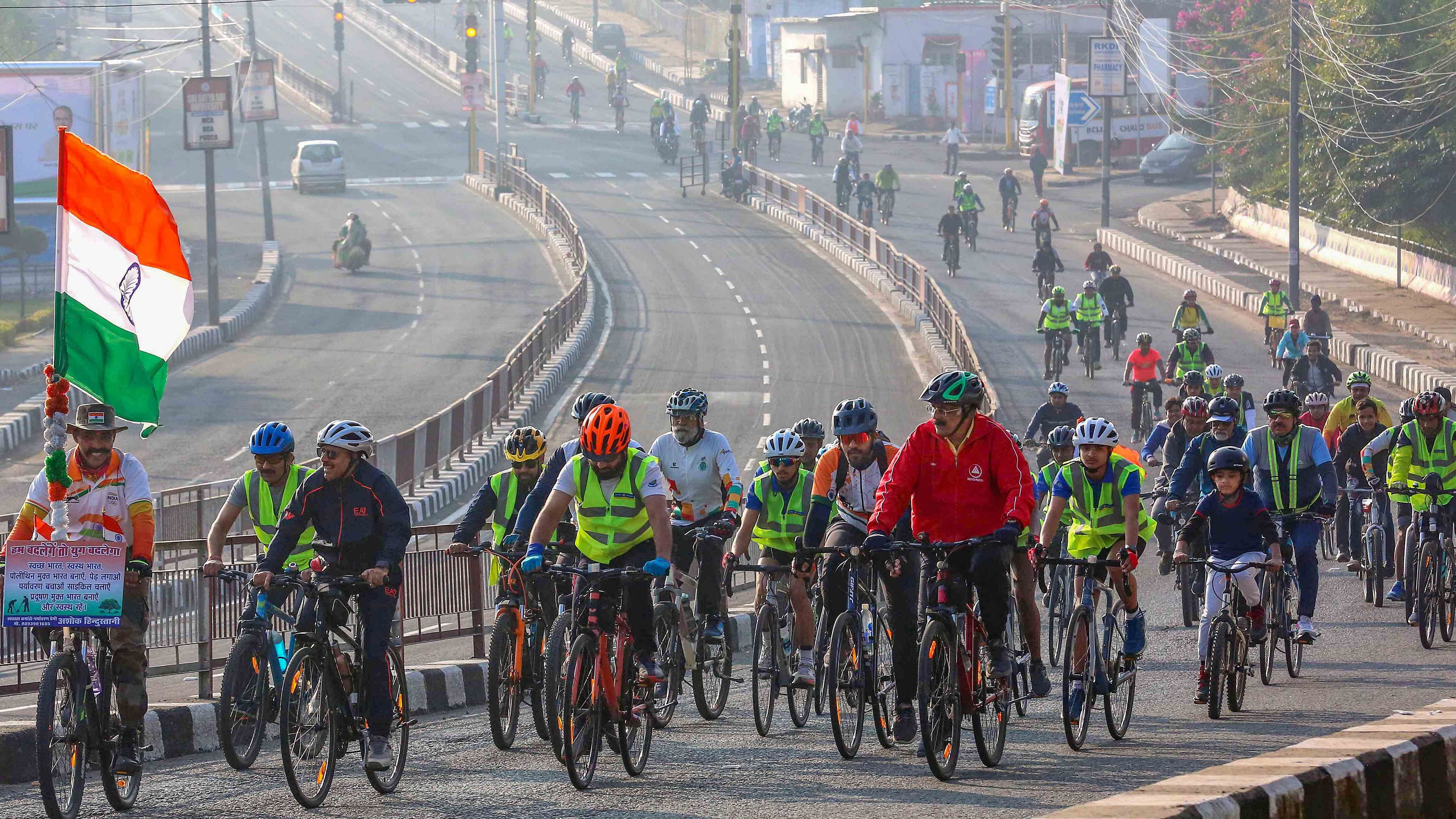 Participants in a bicycle rally ahead of the Khelo India Youth Games-2022, in Bhopal. Credit: PTI Photo