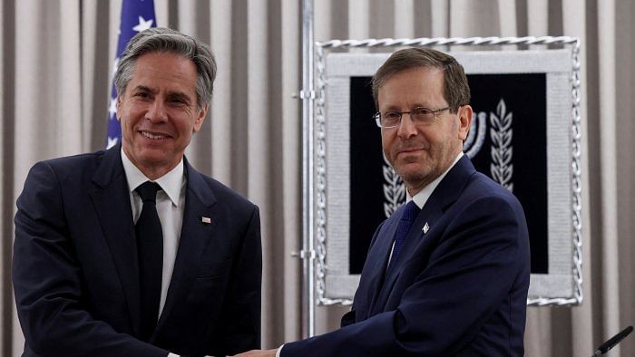 US Secretary of State Antony Blinken poses for a picture with Israeli President Isaac Herzog. Credit: Reuters Photo