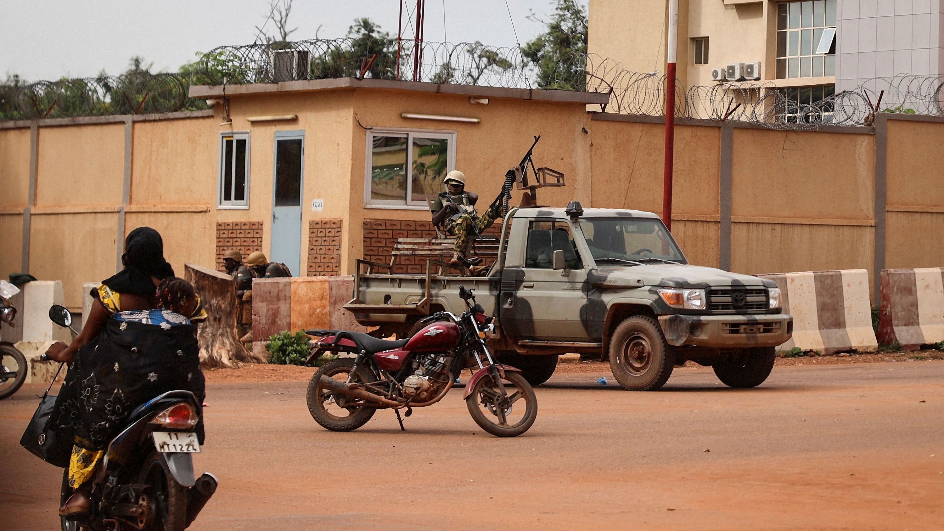 In this file photo taken on September 30, 2022 Burkina Faso soldiers are seen deployed in Ouagadougou. - An attack by suspected jihadists in northern Burkina Faso has killed 13 people, including 10 military police, the army said on January 31, 2023.  Credit: AFP Photo