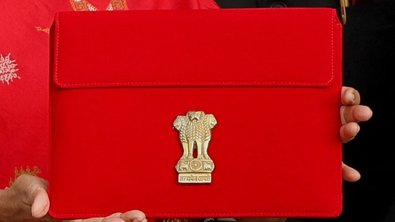 Sitharaman had in her first Budget in 2019 replaced leather briefcase -- which had been in used for decades for carrying Budget documents -- with a traditional 'bahi-khata' wrapped in a red cloth. Credit: Reuters Photo