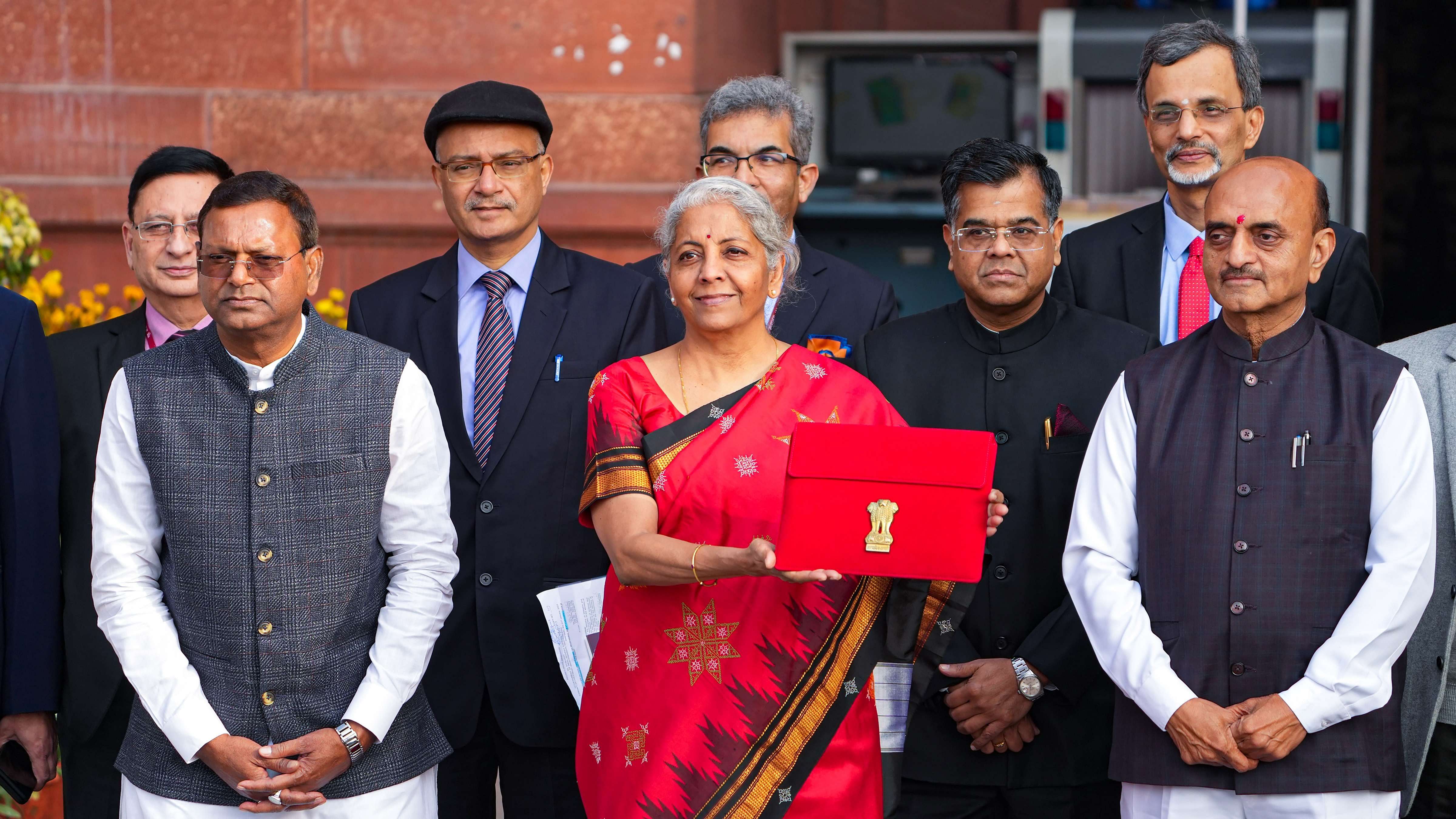 Union Finance Minister Nirmala Sitharaman with Ministers of State Bhagwat Kishanrao Karad and Pankaj Chaudhary and officials. Credit: PTI Photo