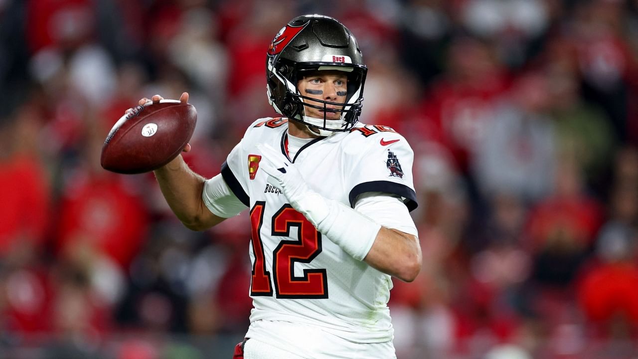 In this photo taken on January 16, 2023, NFL star Tom Brady of the Tampa Bay Buccaneers throws a pass against the Dallas Cowboys during the second half in the NFC Wild Card playoff game at Raymond James Stadium in Tampa, Florida. Credit: AFP File Photo